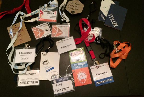 photo of many tech conference badges